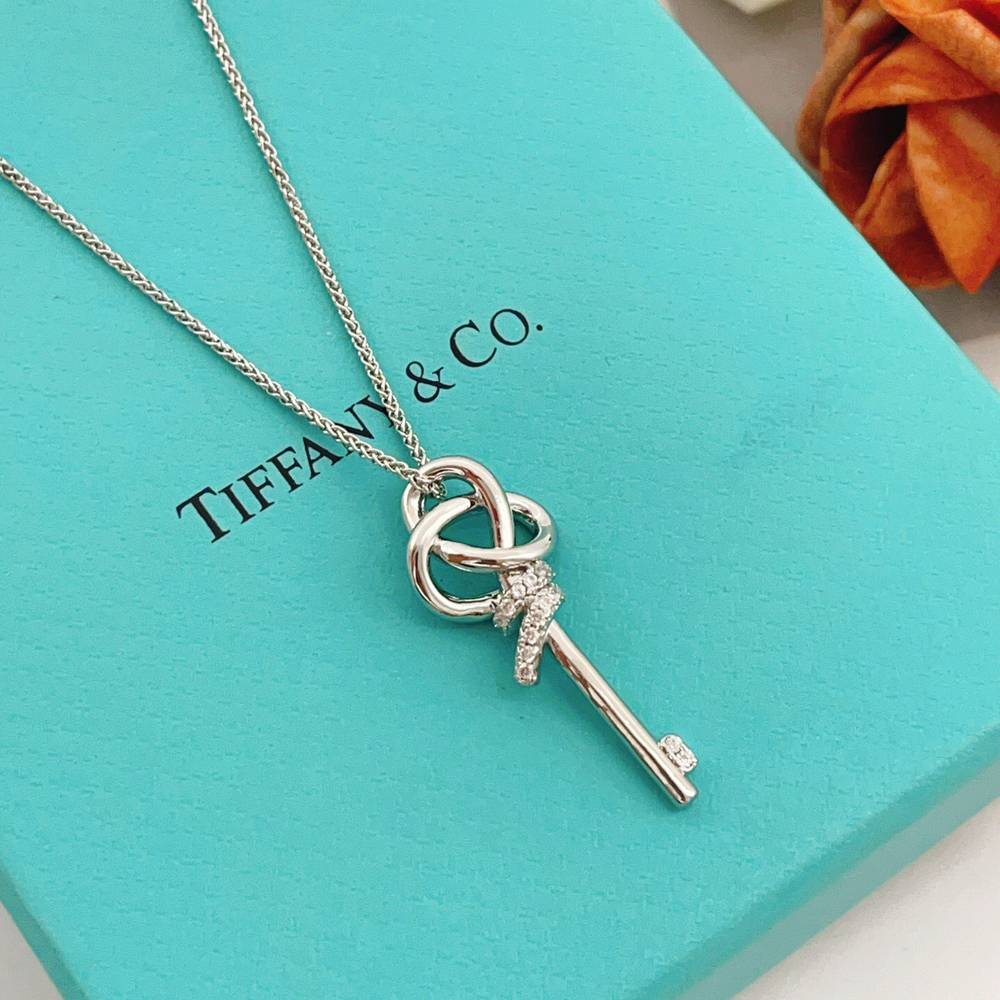Tiffany & Co. Silver diamond-encrusted key necklace